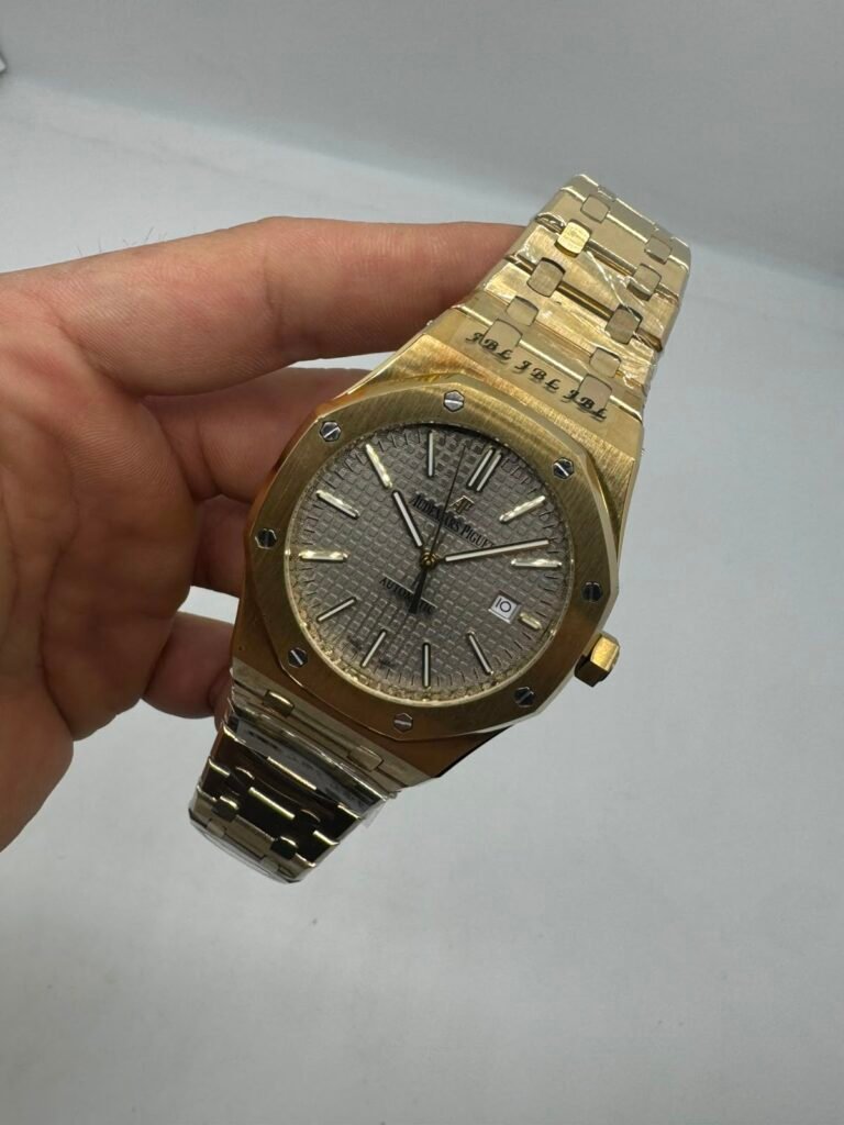 Audemars Piguet Royal Oak 42mm - Aço dourado Mostrador branco