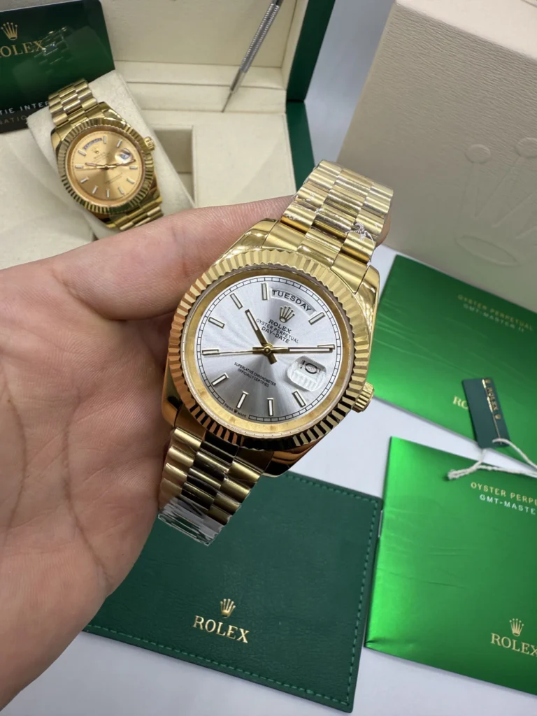 Day-Date President 40mm - AÇO COM DOURADO MOSTRADOR PRATA