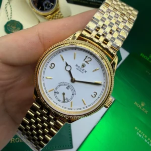 Perpetual 1908 - 40mm - AÇO DOURADO MOSTRADOR BRANCO - FUNDO DE VIDRO