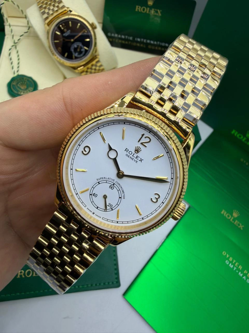 Perpetual 1908 - 40mm - AÇO DOURADO MOSTRADOR BRANCO - FUNDO DE VIDRO