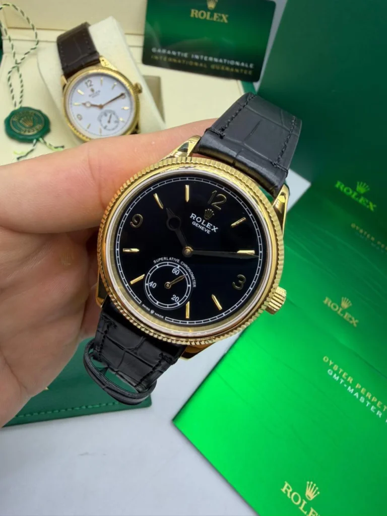 Perpetual 1908 - 40mm - AÇO DOURADO MOSTRADOR PRETO - FUNDO DE VIDRO - COURO