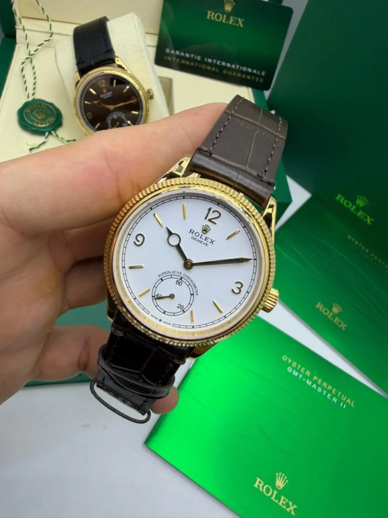 Perpetual 1908 - 40mm - AÇO DOURADO MOSTRADOR BRANCO - FUNDO DE VIDRO - COURO