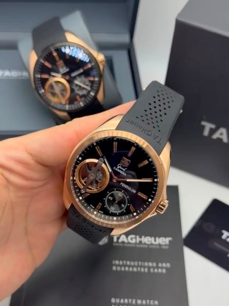 TAG Heuer Carrera Pendulum 48mm - AÇO DOURADO MOSTRADOR PRETO - SILICONE