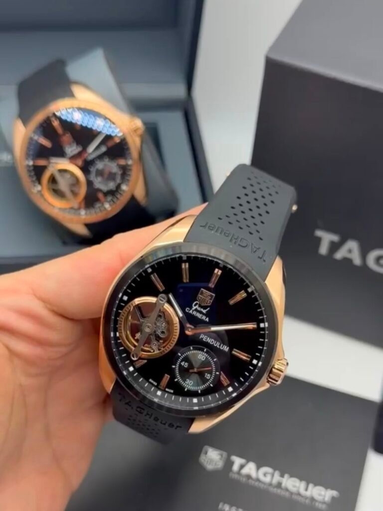 TAG Heuer Carrera Pendulum 48mm - AÇO ROSE MOSTRADOR PRETO - SILICONE
