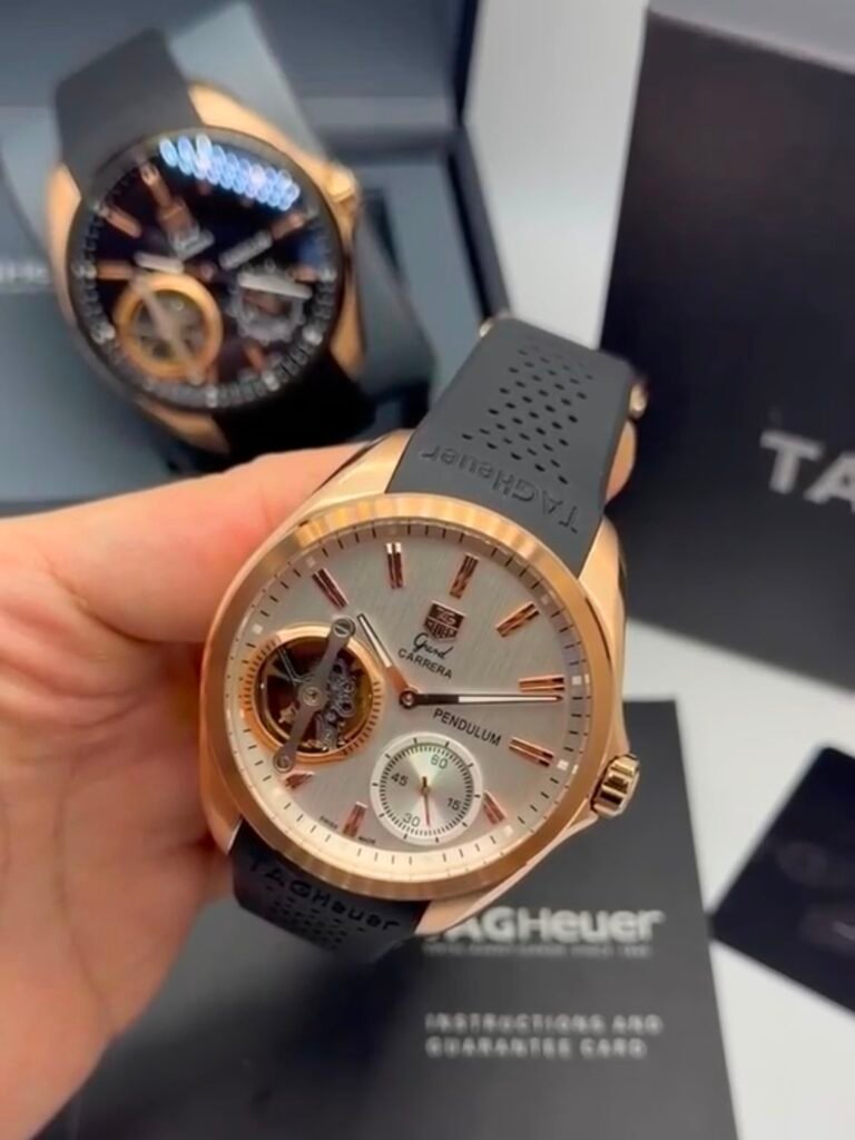TAG Heuer Carrera Pendulum 48mm - AÇO DOURADO MOSTRADOR BRANCO - SILICONE